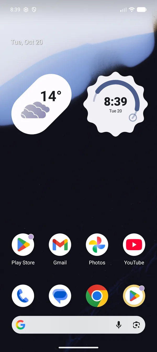 Home screen with the pill widget showing 14 degrees and clouds